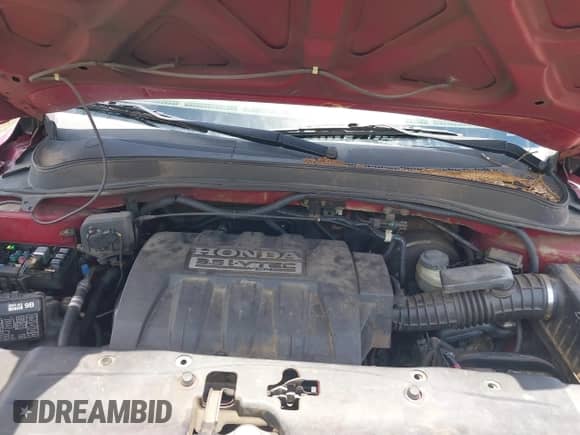 2006 Honda Pilot EX-L z VIN 5FNYF285X6B023146, wystawiony jako IAAI lot #42395707 z przebiegiem Nie podano mil oraz . Historia ofert i sprzedaży dostępna na DreamBid. Obrazek 10.