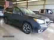 2014 Subaru Forester XT Touring z VIN JF2SJGMC0EH542664, wystawiony jako Copart lot #82309135 z przebiegiem 125 941 mil mil oraz Czysty tytuł • Clean title. Historia ofert i sprzedaży dostępna na DreamBid. Obrazek 4.