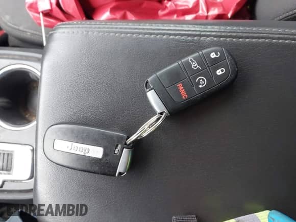 2018 Jeep Grand Cherokee Laredo E with VIN 1C4RJFAG1JC370361, listed as a IAAI auction lot 43284928 with 75,952 mi miles and . Bid and sale history available at DreamBid. Image 10.