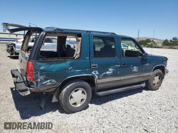 1997 Chevrolet Tahoe с VIN 1GNEK13R0VJ437621, выставлен на аукционе Copart как лот 52763335 с пробегом 147 522 миль миль и Списание • Salvage title. История ставок и продаж доступна на DreamBid. Изображение 3.