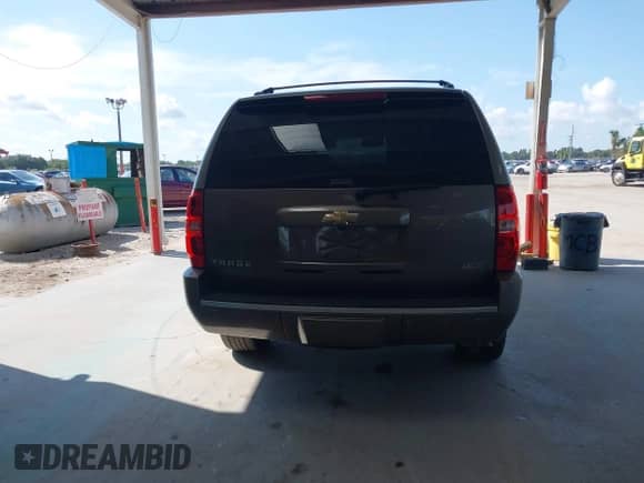 2011 Chevrolet Tahoe LTZ with VIN 1GNSCCE09BR333023, listed as a IAAI auction lot 43085215 with 165,616 mi miles and . Bid and sale history available at DreamBid. Image 16.