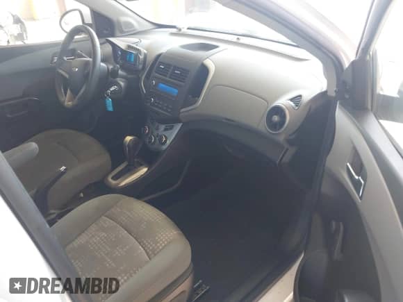 2014 Chevrolet Sonic LS with VIN 1G1JA6SG3E4184342, listed as a IAAI auction lot 42955779 with 131,345 mi miles and . Bid and sale history available at DreamBid. Image 5.