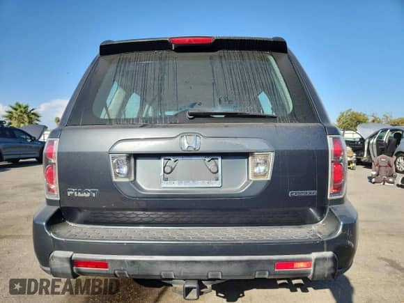 2006 Honda Pilot LX с VIN 2HKYF18156H562492, выставлен на аукционе Copart как лот 71533175 с пробегом 214 671 миль миль и Чистый • Clean title. История ставок и продаж доступна на DreamBid. Изображение 6.