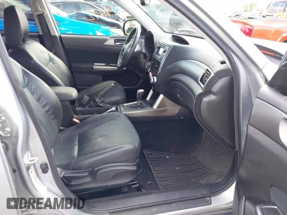 2012 Subaru Forester X Limited z VIN JF2SHAEC3CH450047, wystawiony jako IAAI lot #43489172 z przebiegiem 128 132 mil mil oraz . Historia ofert i sprzedaży dostępna na DreamBid. Obrazek 5.