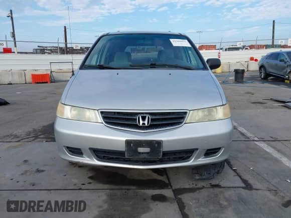 2004 Honda Odyssey LX with VIN 5FNRL18524B042391, listed as a IAAI auction lot 43280655 with 165,252 mi miles and . Bid and sale history available at DreamBid. Image 13.