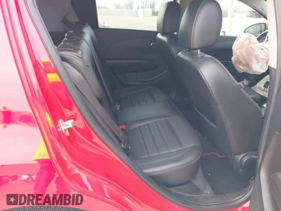 2016 Chevrolet Sonic RS z VIN 1G1JG6SB6G4168724, wystawiony jako IAAI lot #41363232 z przebiegiem 99 818 mil mil oraz . Historia ofert i sprzedaży dostępna na DreamBid. Obrazek 8.