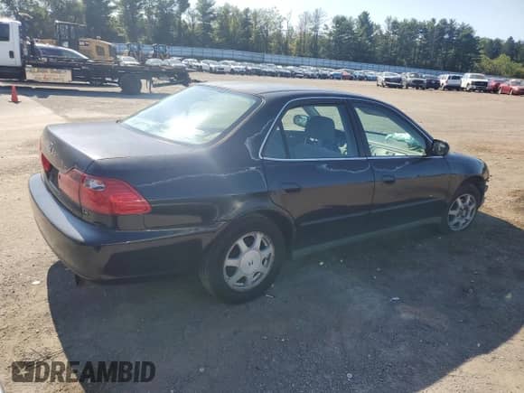 2000 Honda Accord LX с VIN 1HGCG6652YA142596, выставлен на аукционе Copart как лот 80483945 с пробегом 376 012 миль миль и Списание • Salvage title. История ставок и продаж доступна на DreamBid. Изображение 3.