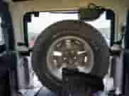 2015 Jeep Wrangler Rubicon with VIN 1C4BJWCG8FL691061, listed as a Copart auction lot 56528213 with 100,927 mi miles and . Bid and sale history available at DreamBid. Image 10.