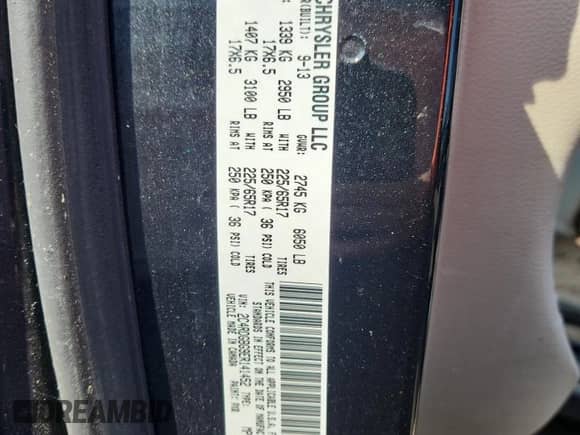2014 Dodge Grand Caravan SE with VIN 2C4RDGBG9ER141452, listed as a Copart auction lot 66575455 with 198,263 mi miles and Clean title. Bid and sale history available at DreamBid. Image 12.