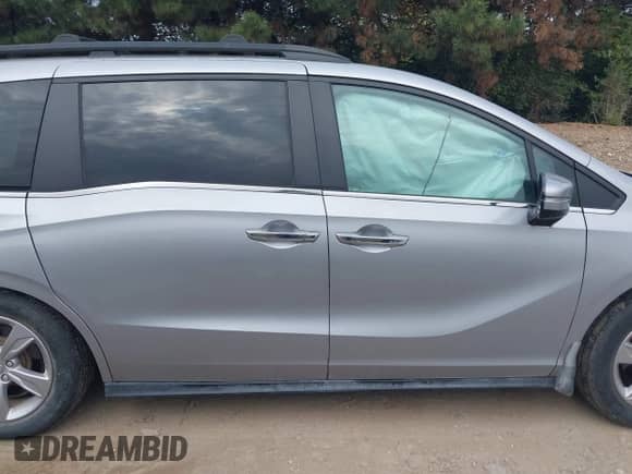 2019 Honda Odyssey EX-L with VIN 5FNRL6H75KB071377, listed as a IAAI auction lot 43459720 with 27,026 mi miles and . Bid and sale history available at DreamBid. Image 13.