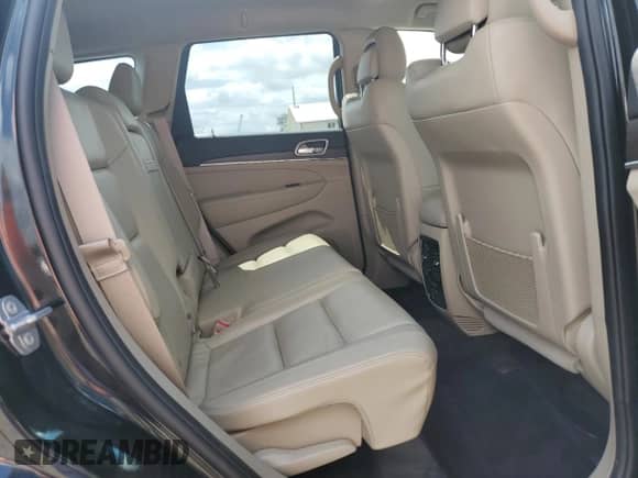 2018 Jeep Grand Cherokee Limited z VIN 1C4RJFBG5JC388859, wystawiony jako Copart lot #69428975 z przebiegiem 79 804 mil mil oraz Szkoda całkowita • Salvage title. Historia ofert i sprzedaży dostępna na DreamBid. Obrazek 11.