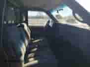 1997 GMC Sierra 1500 z VIN 1GTEK14R3VZ506326, wystawiony jako Copart lot #87036644 z przebiegiem 212 945 mil mil oraz Czysty tytuł • Clean title. Historia ofert i sprzedaży dostępna na DreamBid. Obrazek 10.