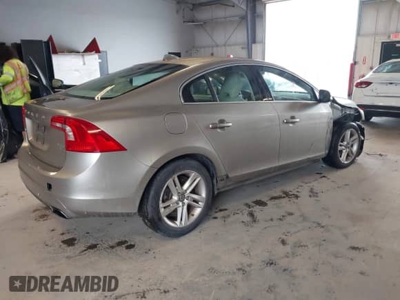 2015 Volvo S60 T5 Drive-E Premier with VIN YV126MFK7F1337818, listed as a IAAI auction lot 42680724 with 125,805 mi miles and . Bid and sale history available at DreamBid. Image 4.
