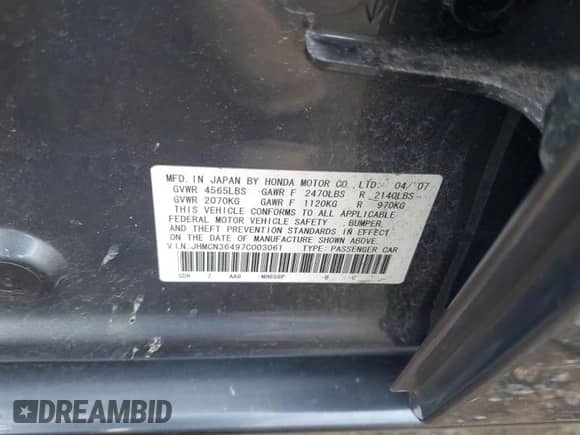 2007 Honda Accord with VIN JHMCN36497C003061, listed as a Copart auction lot 59979625 with 128,088 mi miles and Salvage title. Bid and sale history available at DreamBid. Image 12.