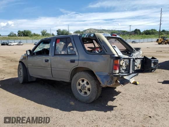 1996 Honda Passport LX с VIN 4S6CM58V1T4405007, выставлен на аукционе Copart как лот 71560165 с пробегом 257 446 миль миль и Списание • Salvage title. История ставок и продаж доступна на DreamBid. Изображение 2.