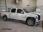2013 GMC Sierra 1500 SLT с VIN 3GTP2WE79DG156685, выставлен на аукционе Copart как лот 55599185 с пробегом 220 968 миль миль и Списание • Salvage title. История ставок и продаж доступна на DreamBid. Изображение 4.