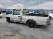 2002 Toyota Tacoma with VIN 5TENL42N82Z080549, listed as a Copart auction lot 80899715 with 115,239 mi miles and Salvage title. Bid and sale history available at DreamBid. Image 2.