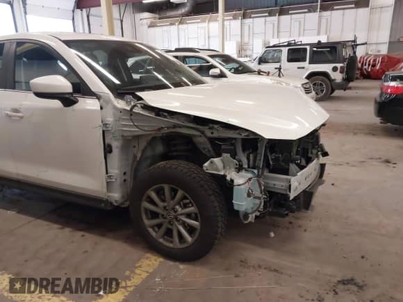 2023 Mazda CX-5 S Preferred z VIN JM3KFBCM4P0240168, wystawiony jako IAAI lot #41979846 z przebiegiem 38 648 mil mil oraz . Historia ofert i sprzedaży dostępna na DreamBid. Obrazek 21.