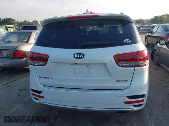 2016 Kia Sorento SXL z VIN 5XYPKDA57GG146717, wystawiony jako IAAI lot #43018518 z przebiegiem 180 078 mil mil oraz . Historia ofert i sprzedaży dostępna na DreamBid. Obrazek 16.