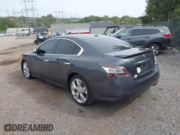 2012 Nissan Maxima SV z VIN 1N4AA5AP0CC856417, wystawiony jako IAAI lot #43166389 z przebiegiem 202 295 mil mil oraz . Historia ofert i sprzedaży dostępna na DreamBid. Obrazek 14.