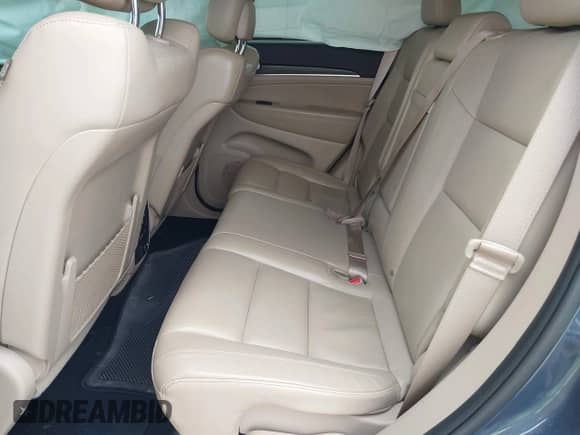 2021 Jeep Grand Cherokee Limited with VIN 1C4RJEBG8MC511987, listed as a IAAI auction lot 41143524 with 63,410 mi miles and . Bid and sale history available at DreamBid. Image 8.