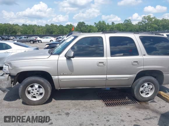 2000 Chevrolet Tahoe LS z VIN 1GNEC13T9YJ185431, wystawiony jako IAAI lot #42517482 z przebiegiem 211 711 mil mil oraz . Historia ofert i sprzedaży dostępna na DreamBid. Obrazek 14.