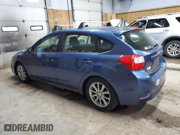 2012 Subaru Impreza Premium with VIN JF1GPAC61CH245269, listed as a Copart auction lot 90350265 with 135,382 mi miles and Clean title. Bid and sale history available at DreamBid. Image 2.