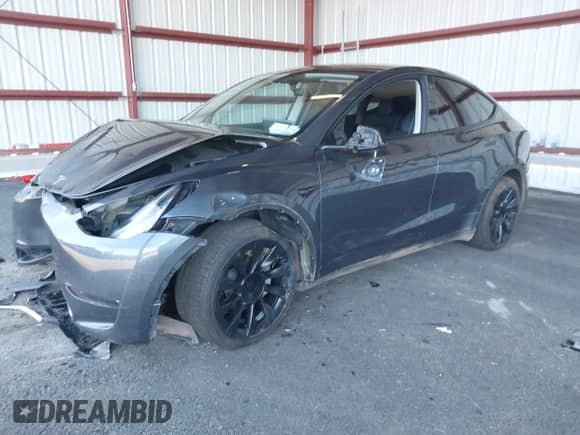 2022 Tesla Model Y Long Range z VIN 7SAYGDEE9NA010903, wystawiony jako IAAI lot #43397965 z przebiegiem 20 830 mil mil oraz . Historia ofert i sprzedaży dostępna na DreamBid. Obrazek 19.