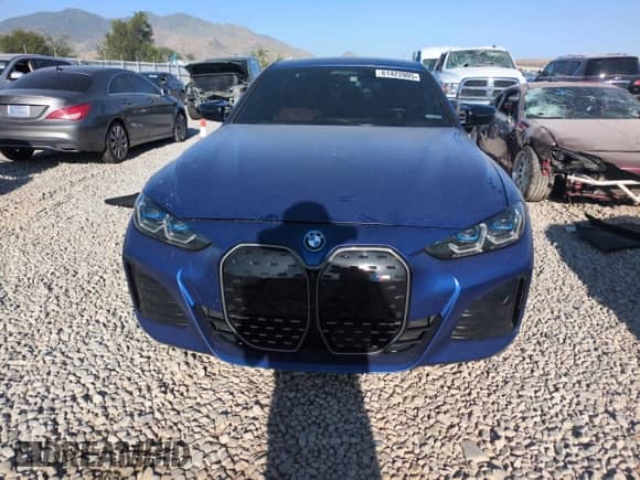 2023 BMW i4 M50 with VIN WBY33AW06PFN71595, listed as a Copart auction lot 61422005 with 34,241 mi miles and Salvage title. Bid and sale history available at DreamBid. Image 5.