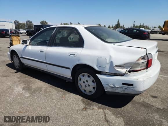 1997 Honda Accord LX with VIN 1HGCD5634VA244155, listed as a Copart auction lot 70736475 with 239,580 mi miles and Salvage title. Bid and sale history available at DreamBid. Image 2.