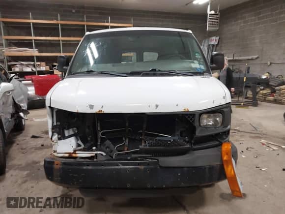 2012 Chevrolet Express Cargo with VIN 1GCWGGBA0C1100411, listed as a IAAI auction lot 41024219 with 197,251 mi miles and . Bid and sale history available at DreamBid. Image 11.