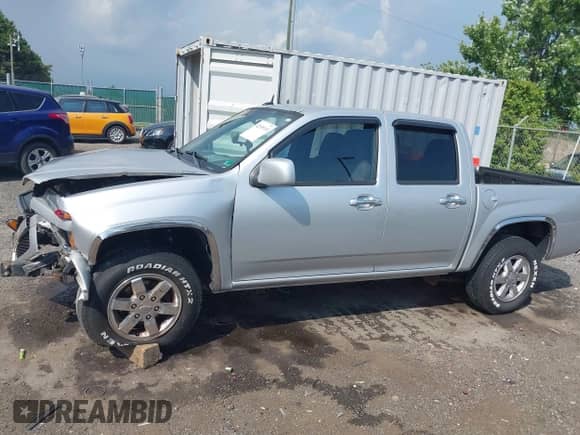 2011 Chevrolet Colorado 1LT z VIN 1GCHTCFEXB8131732, wystawiony jako IAAI lot #42595193 z przebiegiem 129 689 mil mil oraz . Historia ofert i sprzedaży dostępna na DreamBid. Obrazek 15.