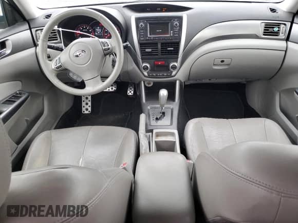 2013 Subaru Forester XT Touring с VIN JF2SHGGC6DH434166, выставлен на аукционе Copart как лот 82132484 с пробегом 174 442 миль миль и Списание • Salvage title. История ставок и продаж доступна на DreamBid. Изображение 8.