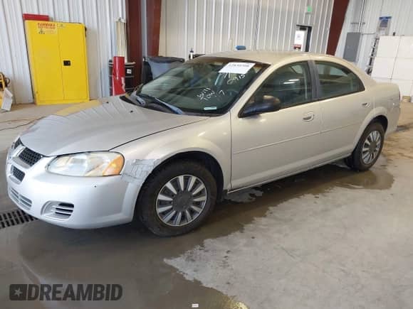 2005 Dodge Stratus SXT with VIN 1B3EL46X75N559047, listed as a IAAI auction lot 42830208 with 243,277 mi miles and . Bid and sale history available at DreamBid. Image 2.