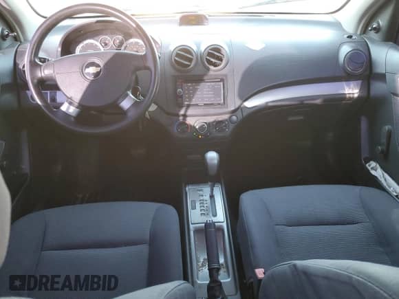 2007 Chevrolet Aveo LS с VIN KL1TD56687B176682, выставлен на аукционе Copart как лот 71817744 с пробегом 113 247 миль миль и Списание • Salvage title. История ставок и продаж доступна на DreamBid. Изображение 8.