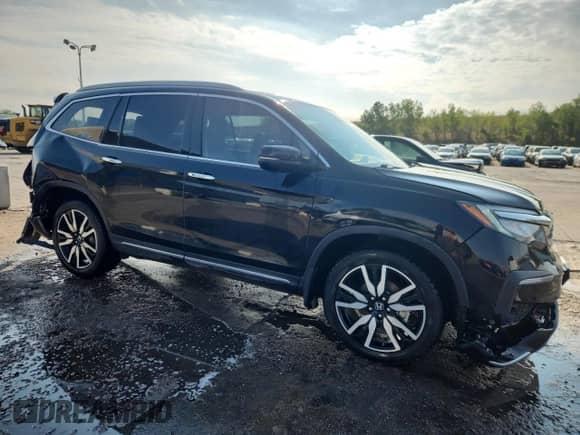 2019 Honda Pilot Touring 7-Passenger z VIN 5FNYF6H69KB092985, wystawiony jako Copart lot #69071955 z przebiegiem 128 915 mil mil oraz Szkoda całkowita • Salvage title. Historia ofert i sprzedaży dostępna na DreamBid. Obrazek 4.