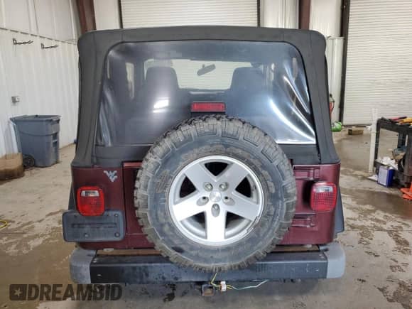 2003 Jeep Wrangler Rubicon с VIN 1J4FA69S83P333373, выставлен на аукционе Copart как лот 61899575 с пробегом 101 120 миль миль и Списание • Salvage title. История ставок и продаж доступна на DreamBid. Изображение 6.