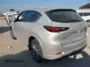 2025 Mazda CX-5 S Preferred z VIN JM3KFBCL1S0639717, wystawiony jako IAAI lot #43416760 z przebiegiem 10 149 mil mil oraz . Historia ofert i sprzedaży dostępna na DreamBid. Obrazek 3.
