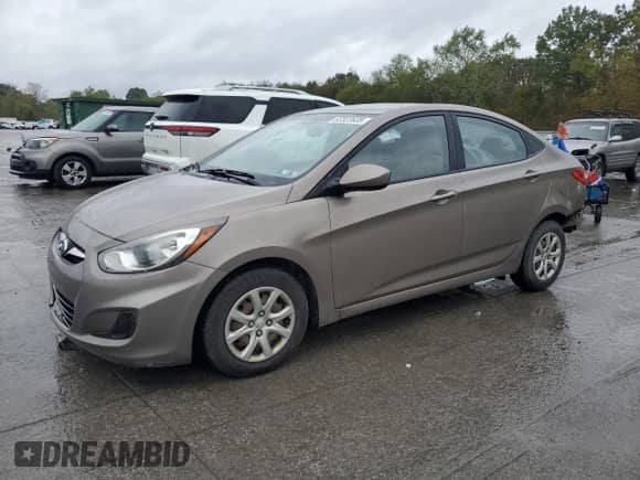 2014 Hyundai Accent GLS with VIN KMHCT4AE0EU613978, listed as a Copart auction lot 82322635 with 132,258 mi miles and Salvage title. Bid and sale history available at DreamBid. Image 1.