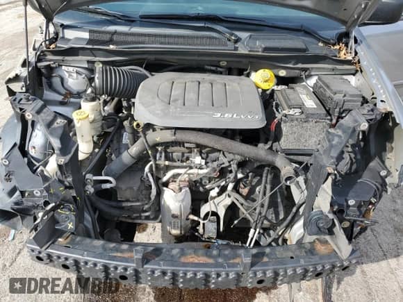 2015 Dodge Grand Caravan American Value with VIN 2C4RDGBG5FR667028, listed as a Copart auction lot 84714815 with 162,470 mi miles and Salvage title. Bid and sale history available at DreamBid. Image 12.