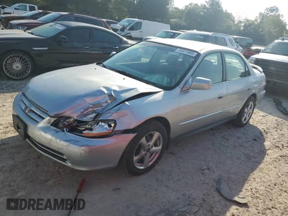 2002 Honda Accord LX with VIN 1HGCG16422A038109, listed as a Copart auction lot 80821885 with 169,787 mi miles and Salvage title. Bid and sale history available at DreamBid. Image 1.