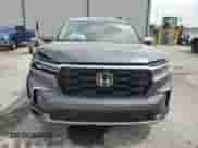 2023 Honda Pilot Touring с VIN 5FNYG2H7XPB000031, выставлен на аукционе Copart как лот 54153935 с пробегом 24 172 миль миль и Списание • Salvage title. История ставок и продаж доступна на DreamBid. Изображение 5.