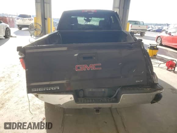 2014 GMC Sierra 1500 SLT z VIN 3GTU2VEC4EG476394, wystawiony jako Copart lot #83988315 z przebiegiem Nie podano mil oraz Szkoda całkowita • Salvage title. Historia ofert i sprzedaży dostępna na DreamBid. Obrazek 6.