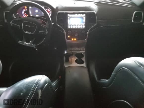 2015 Jeep Grand Cherokee SRT с VIN 1C4RJFDJ1FC620521, выставлен на аукционе Copart как лот 70182775 с пробегом 113 937 миль миль и Списание • Salvage title. История ставок и продаж доступна на DreamBid. Изображение 8.