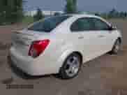 2013 Chevrolet Sonic LTZ with VIN 1G1JE5SB5D4195389, listed as a IAAI auction lot 42400418 with 27,607 mi miles and . Bid and sale history available at DreamBid. Image 4.