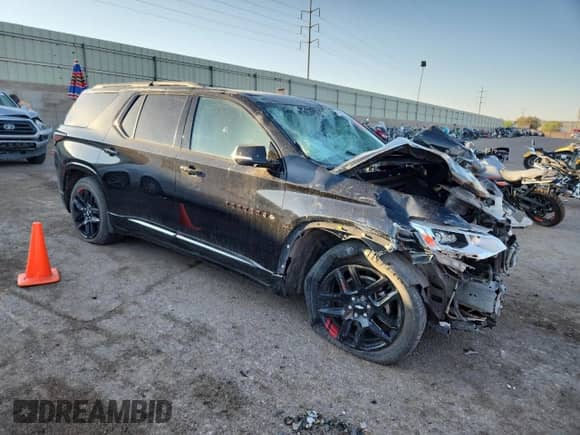 2018 Chevrolet Traverse Premier z VIN 1GNERKKW1JJ124368, wystawiony jako Copart lot #70016525 z przebiegiem 92 975 mil mil oraz Szkoda całkowita • Salvage title. Historia ofert i sprzedaży dostępna na DreamBid. Obrazek 4.
