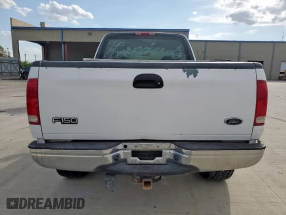 2000 Ford F-150 XL with VIN 1FTRX18L7YNB50273, listed as a Copart auction lot 70456245 with Not provided miles and Salvage title. Bid and sale history available at DreamBid. Image 6.