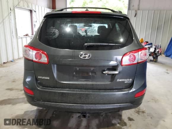 2010 Hyundai Santa Fe Limited with VIN 5NMSK4AG8AH374248, listed as a Copart auction lot 58821985 with 216,307 mi miles and Salvage title. Bid and sale history available at DreamBid. Image 6.