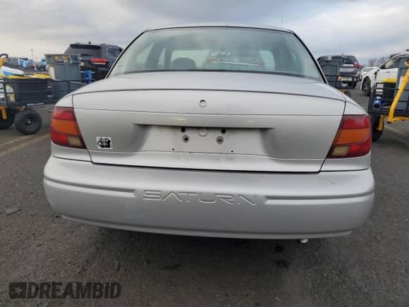 2001 Saturn SL with VIN 1G8ZH52871Z295511, listed as a Copart auction lot 43020175 with 87,008 mi miles and Salvage title. Bid and sale history available at DreamBid. Image 6.