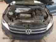 2014 Volkswagen Tiguan SEL with VIN WVGAV3AX8EW563008, listed as a IAAI auction lot 41356523 with 138,211 mi miles and . Bid and sale history available at DreamBid. Image 10.